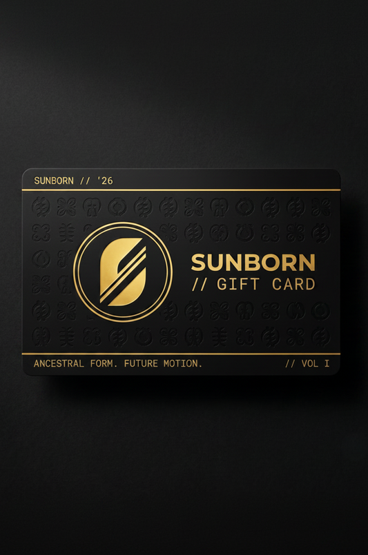 Black gift card with gold text and logo on a dark background
