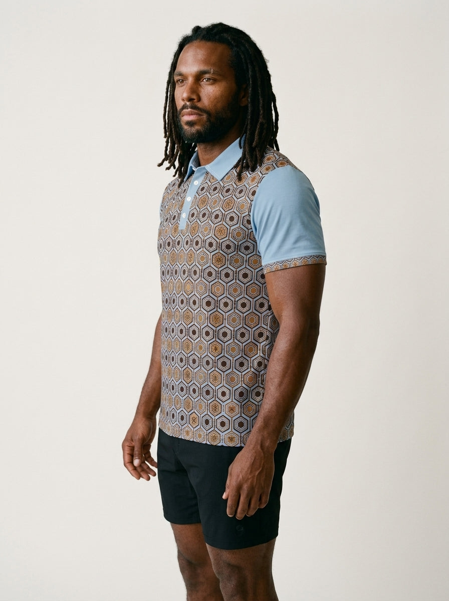 AnanseNova™ // Men's Slim Fit Statement Polo in Igwe Blue — three-quarter left view — SunBorn