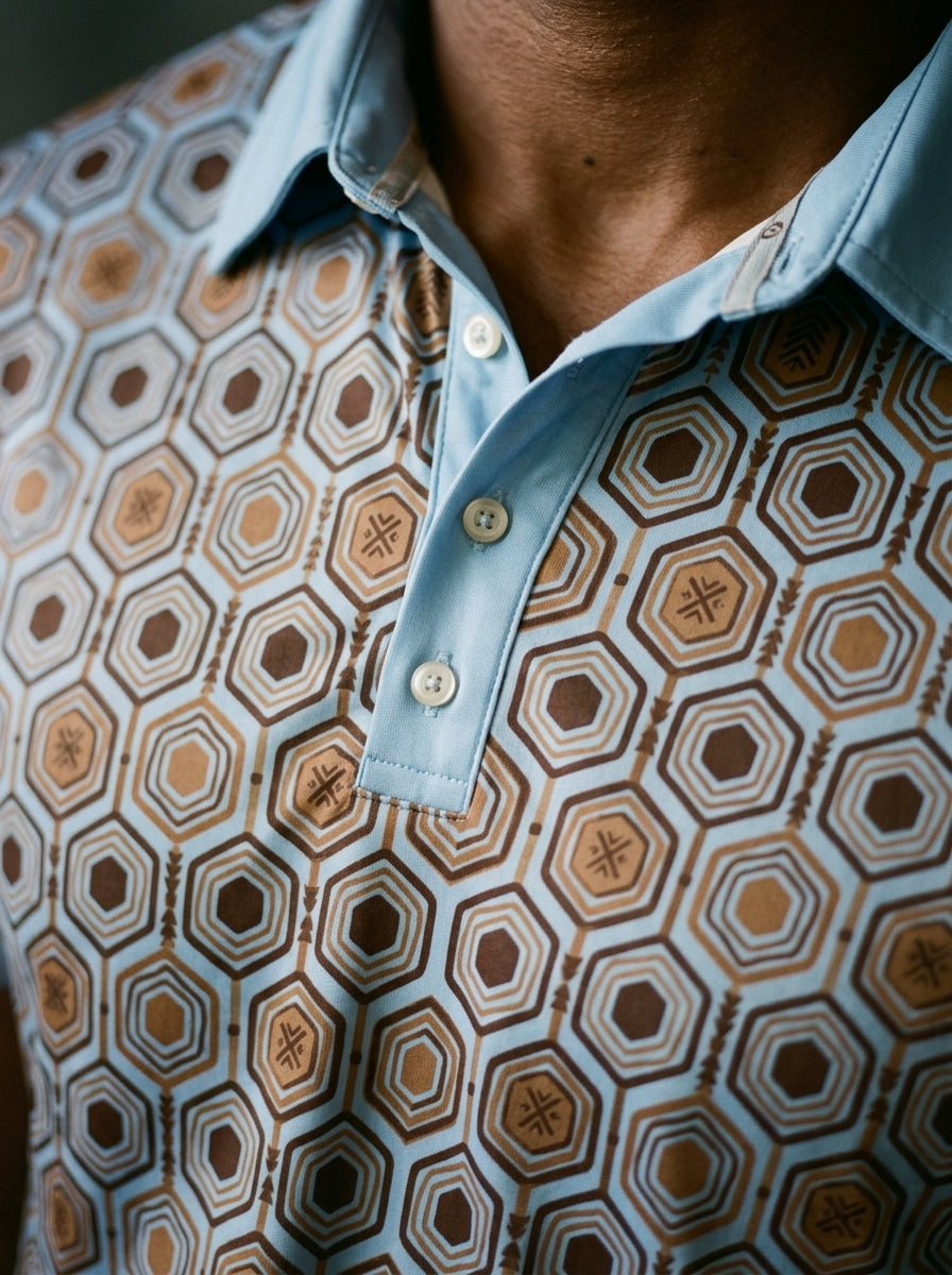 AnanseNova™ // Men's Slim Fit Statement Polo in Igwe Blue — macro detail — SunBorn