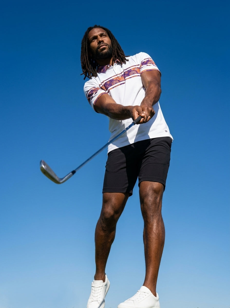 Sankofa Men's Polo — Ocha White — worn on the golf course — men's golf polo shirt — SunBorn