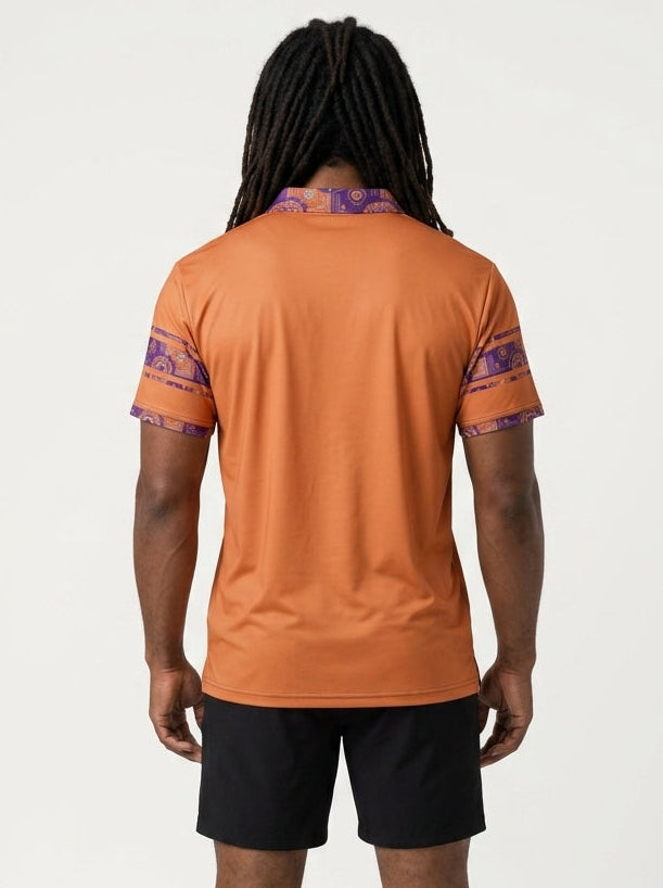 Sankofa Men's Polo — Sango Orange — Kinetic Engine sleeve trim and back panel — SunBorn