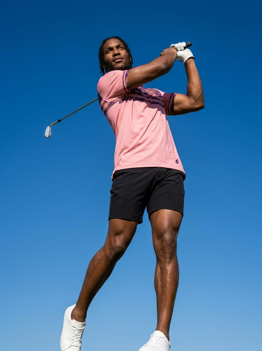 Sankofa Men's Pulse Polo in Eze Pink styled for golf course wear