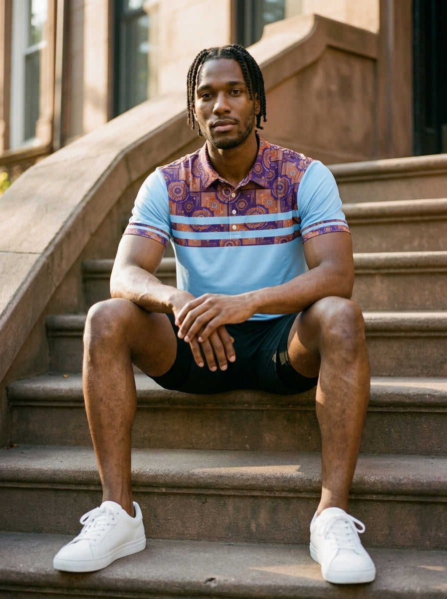 Sankofa Men's Pulse Polo in Igwe Blue worn in street-style editorial setting