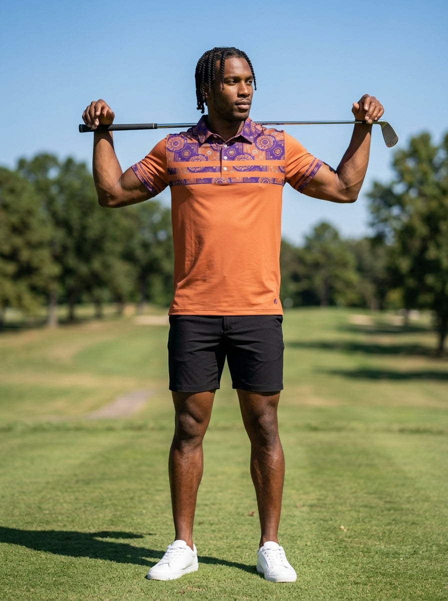 Sankofa Men's Pulse Polo in Sango Orange styled for golf course wear