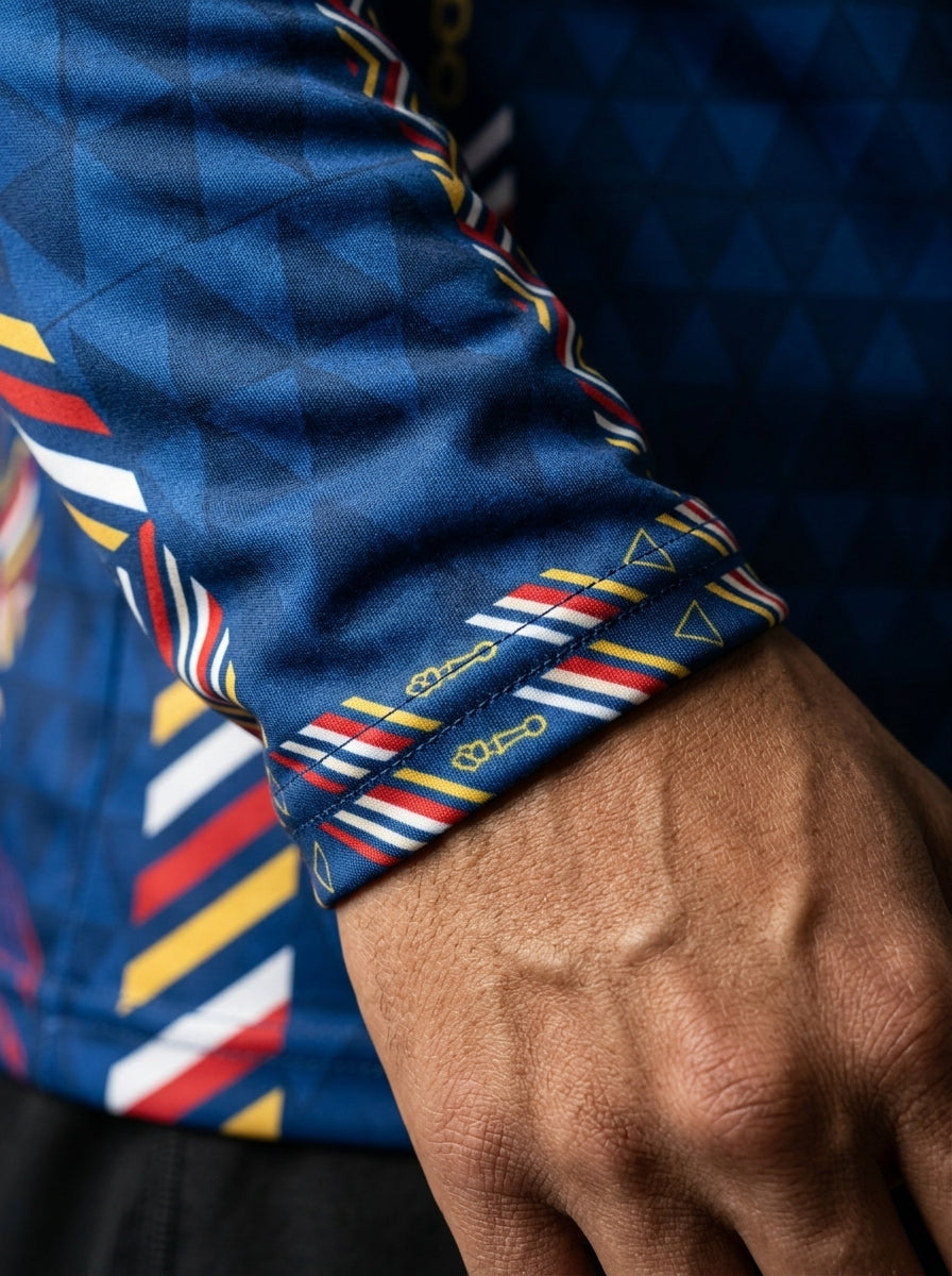 Cabo Verde '26 Blue Shark Protocol Long Sleeve — macro cuff detail, SunBorn