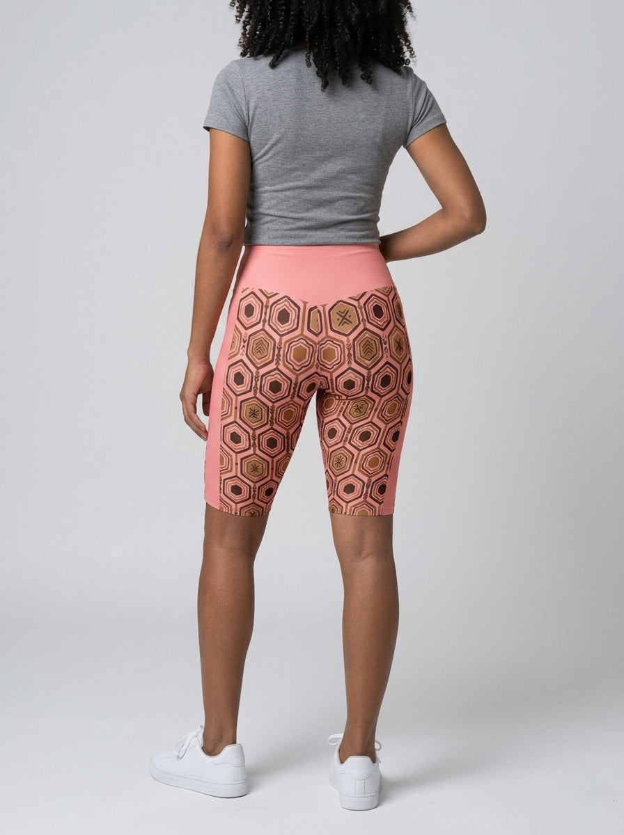 AnanseNova™ Biker Shorts in Adaeze Pink, studio back view — SunBorn