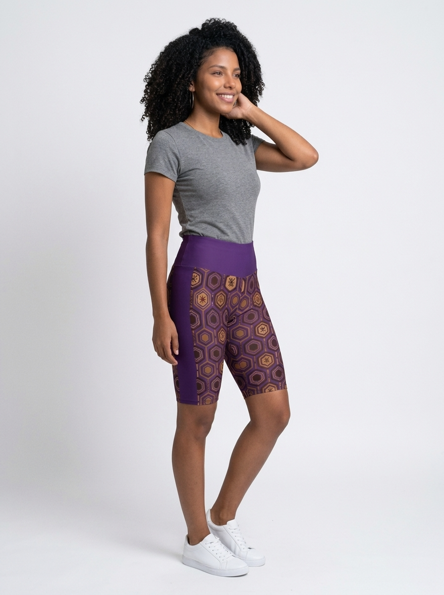 AnanseNova™ Biker Shorts in Ugo Purple, three-quarter right view on model — SunBorn