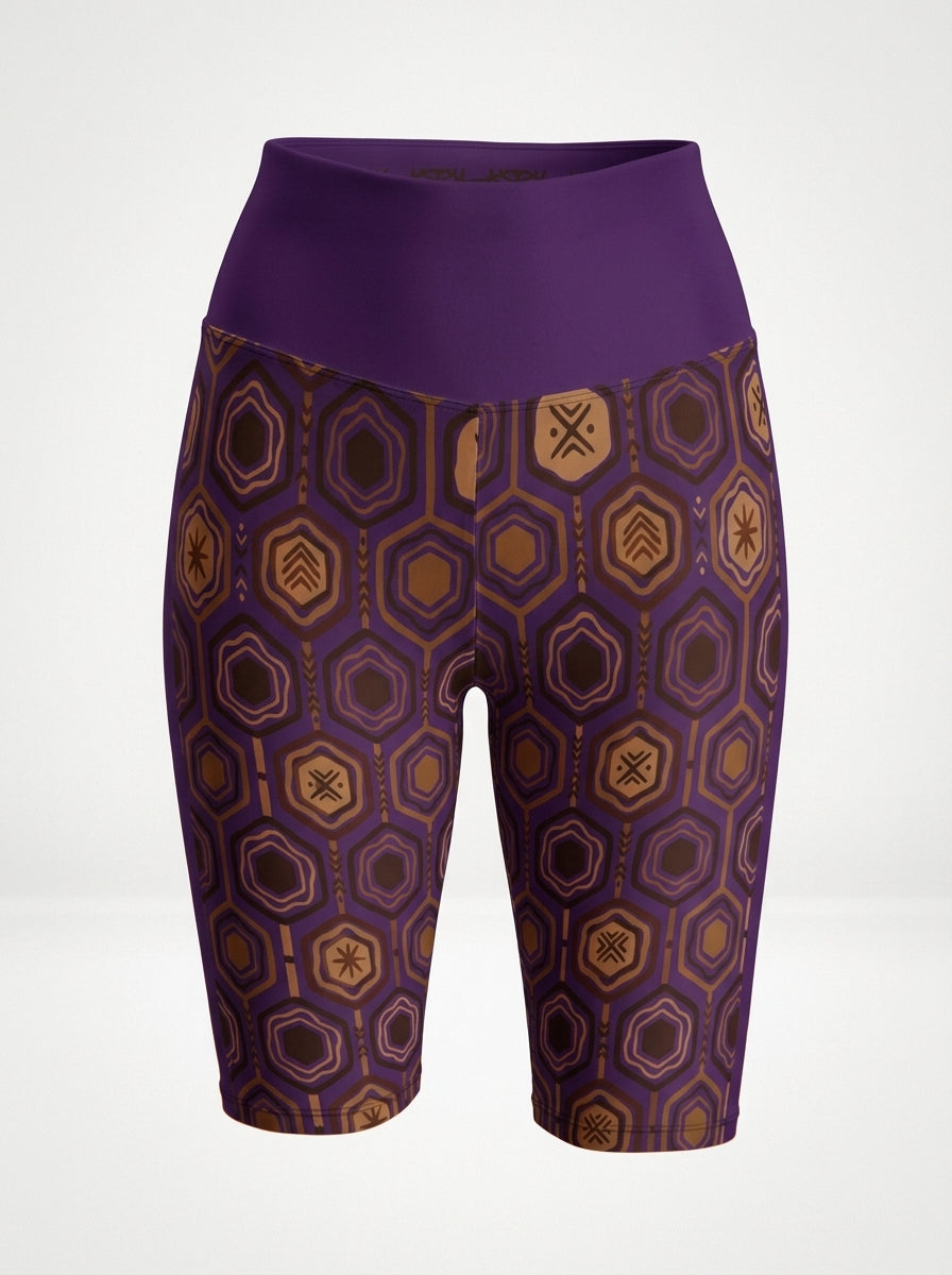 AnanseNova™ Biker Shorts in Ugo Purple, ghost mannequin front view showing the hexagon print and high waistband — SunBorn