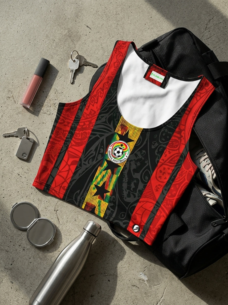Black and red jacket with a soccer emblem on a concrete surface, surrounded by keys and a water bottle.