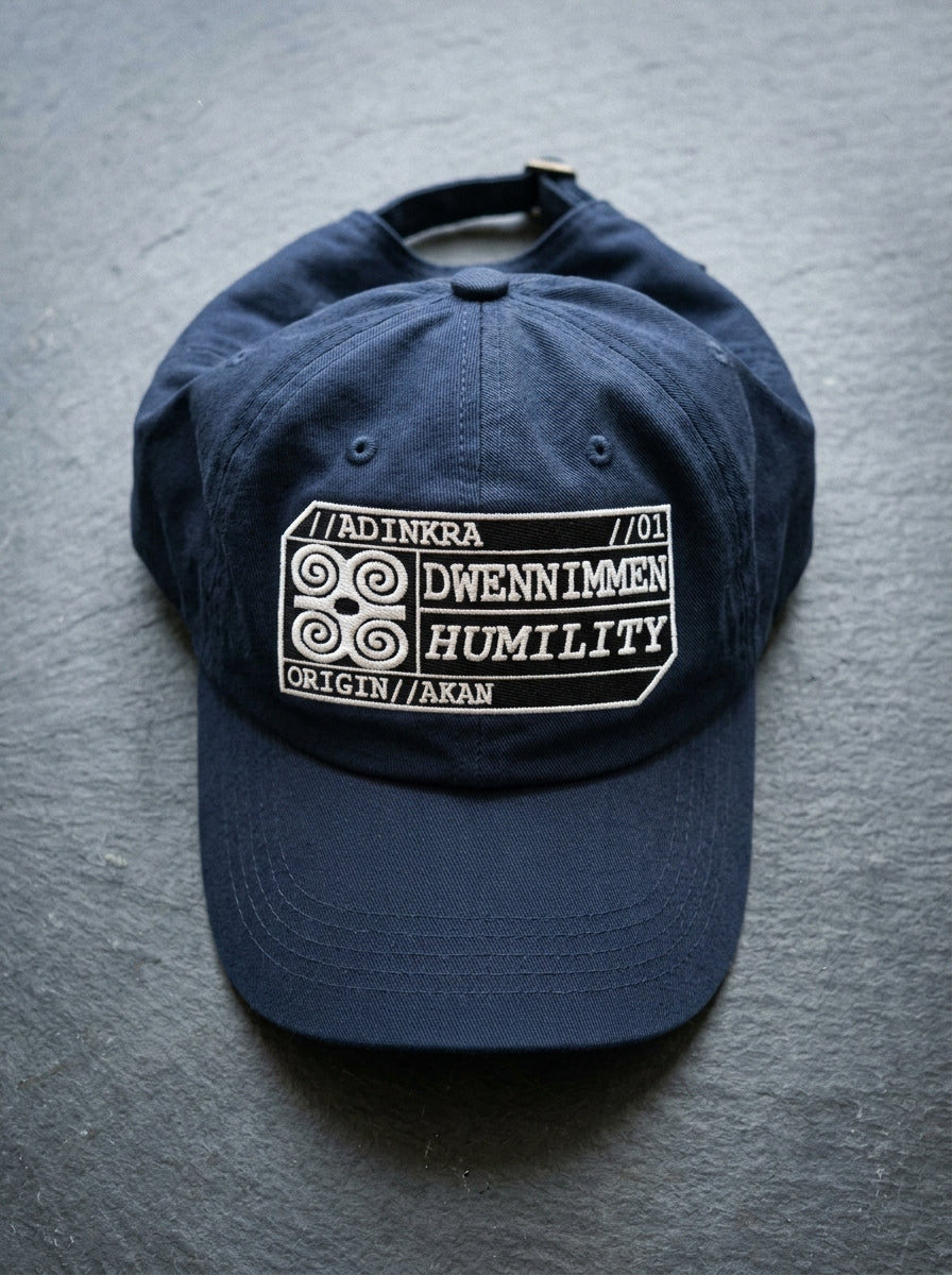 Adinkra Humility Dad Hat in Anụnụ Blue — styled flat lay