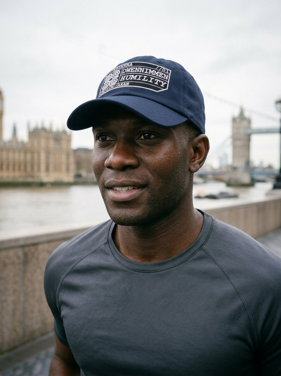 Adinkra Humility Dad Hat in Anụnụ Blue — editorial styled fit