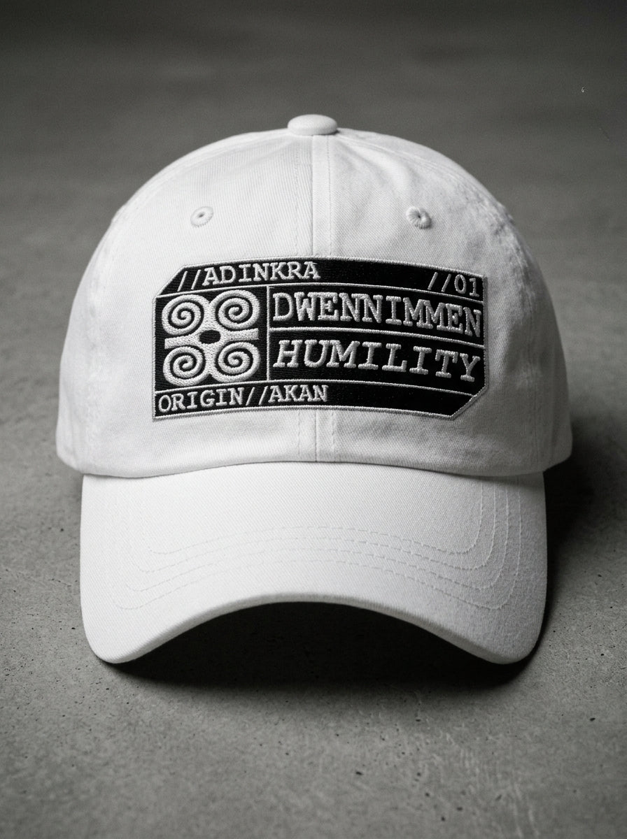 Adinkra Humility Dad Hat in Ocha White — front studio hero shot