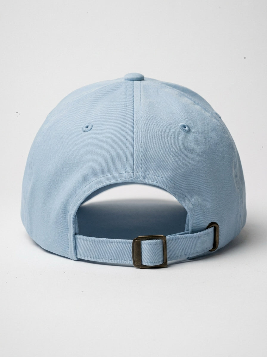 GOAT Celeste Dad Hat in Igwe Blue, rear view with adjustable antique-buckle strap.