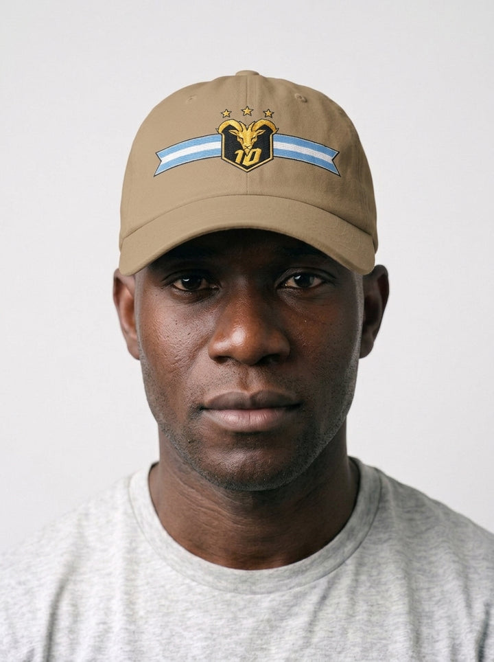 GOAT Celeste Dad Hat in Aja Sand, worn front — low-profile six-panel cotton-twill cap.