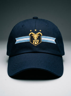GOAT Celeste Dad Hat in Anụnụ Blue, front view — gold goat crest with N°10 and three stars on an Albiceleste ribbon.