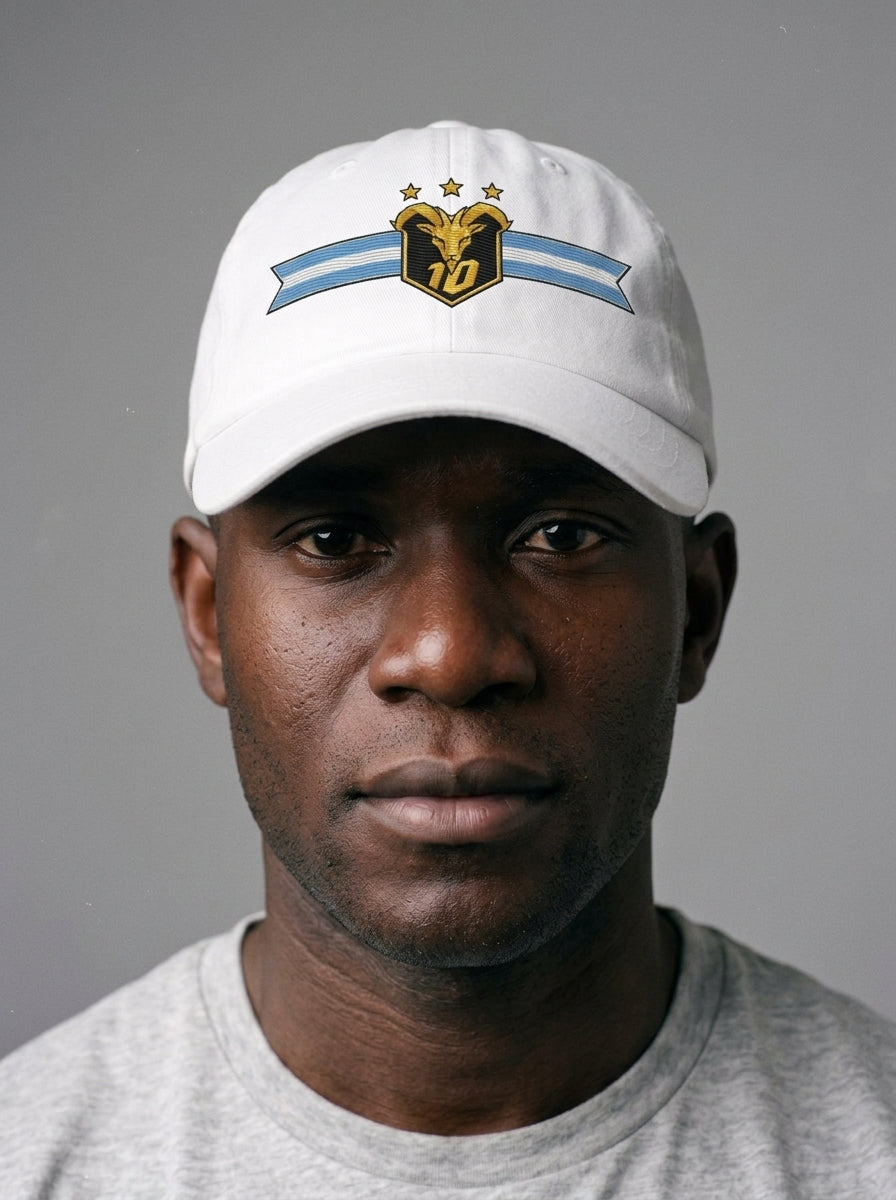 GOAT Celeste Dad Hat in Ocha White, worn front — low-profile six-panel cotton-twill cap.