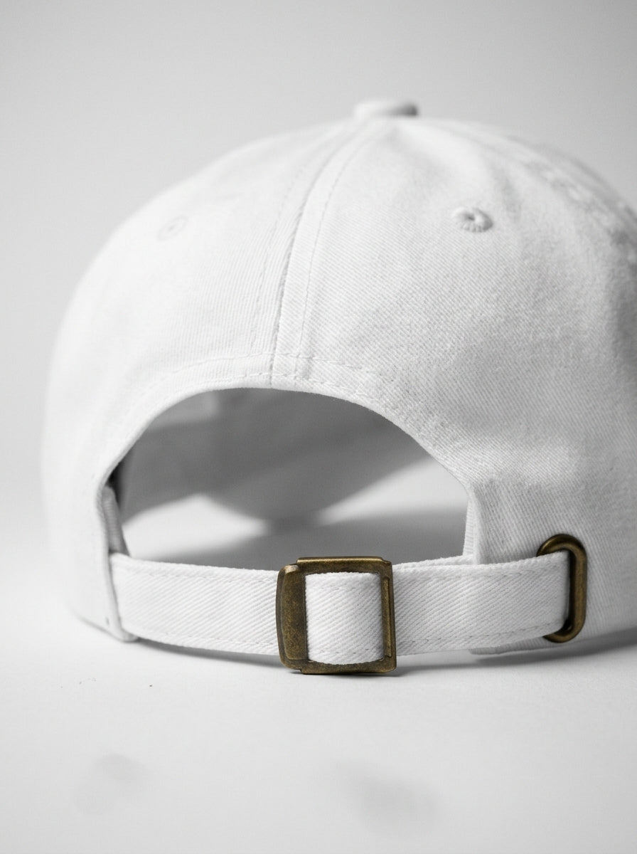 GOAT Celeste Dad Hat in Ocha White, rear view with adjustable antique-buckle strap.