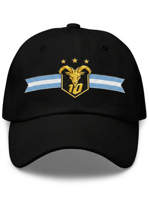 GOAT Celeste Dad Hat in Oji Black, front view — gold goat crest with N°10 and three stars on an Albiceleste ribbon.