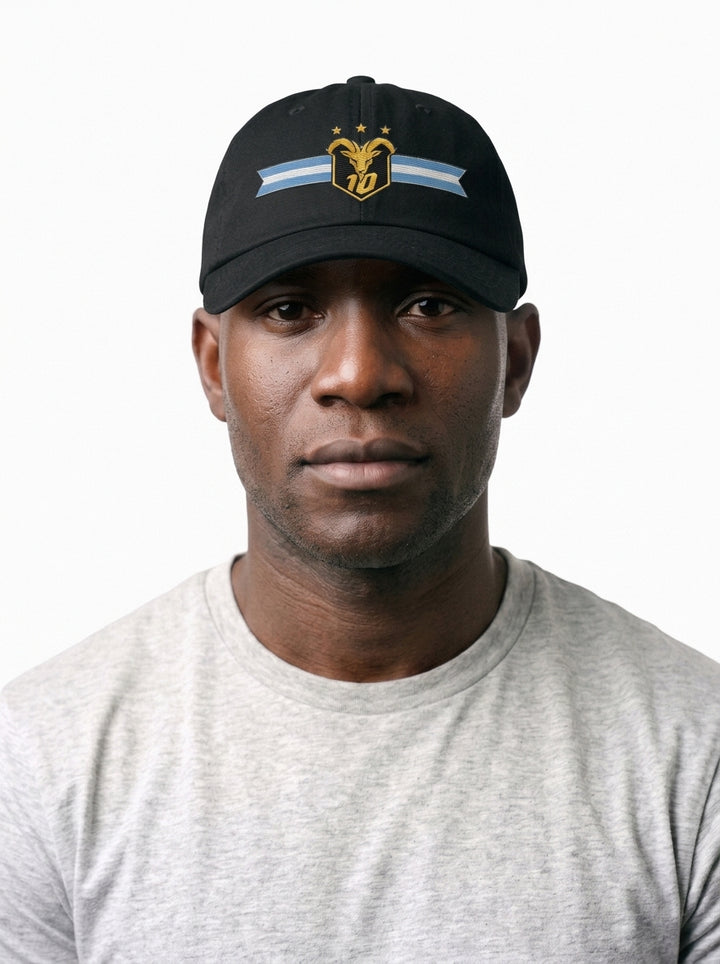 GOAT Celeste Dad Hat in Oji Black, worn front — low-profile six-panel cotton-twill cap.
