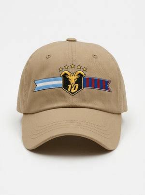 GOAT Fusión dad hat in Aja Sand — front view, full-colour both-flags crest (gold goat, N°10, five stars) embroidered on the crown