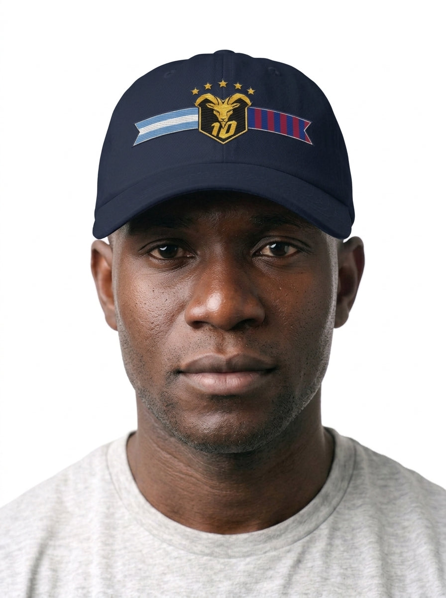 GOAT Fusión dad hat in Anụnụ Blue, worn — the both-flags GOAT crest front and centre