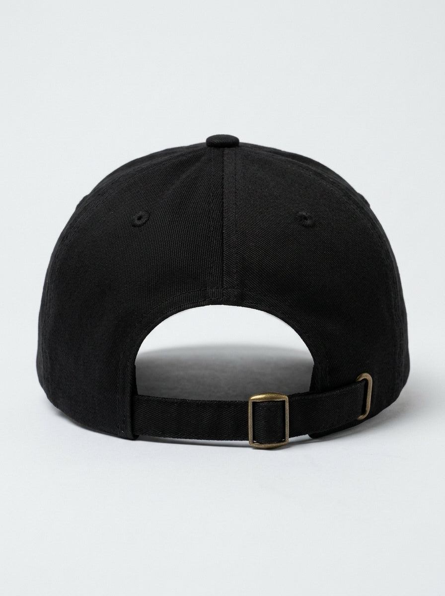 GOAT Fusión dad hat in Oji Black — rear view with the adjustable antique-buckle strap