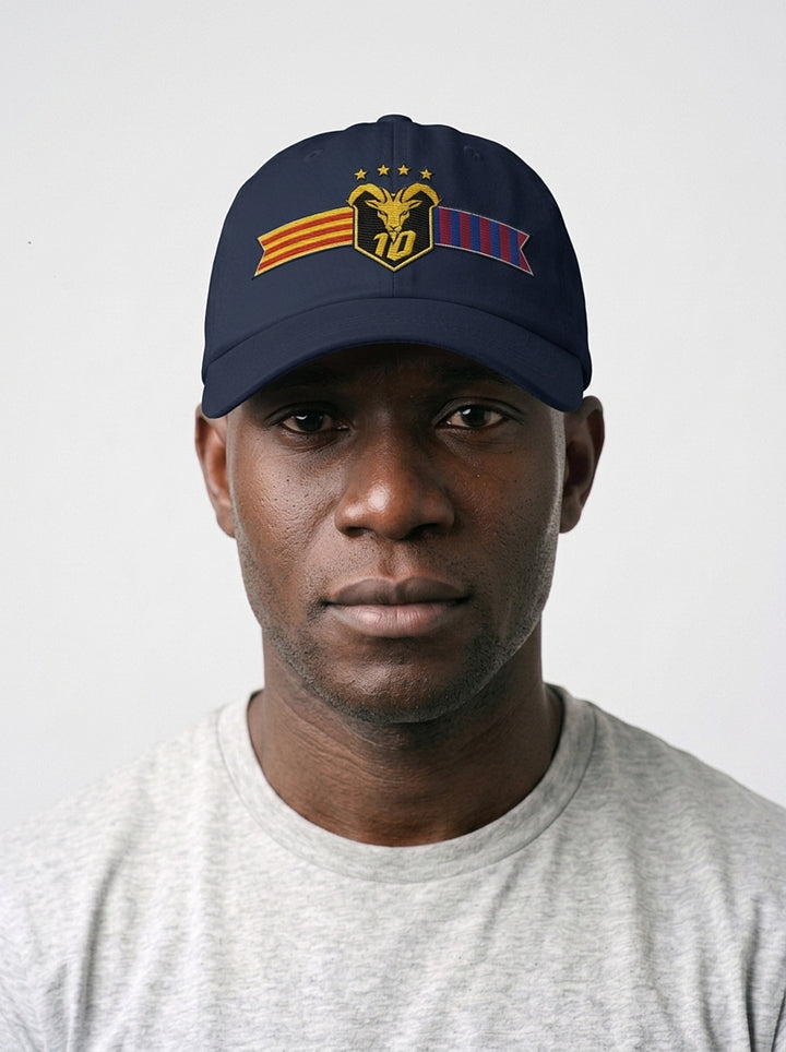 Model wearing the GOAT Catalan dad hat in Anụnụ Blue, front view, showing the embroidered Catalan crest on the low-profile crown.
