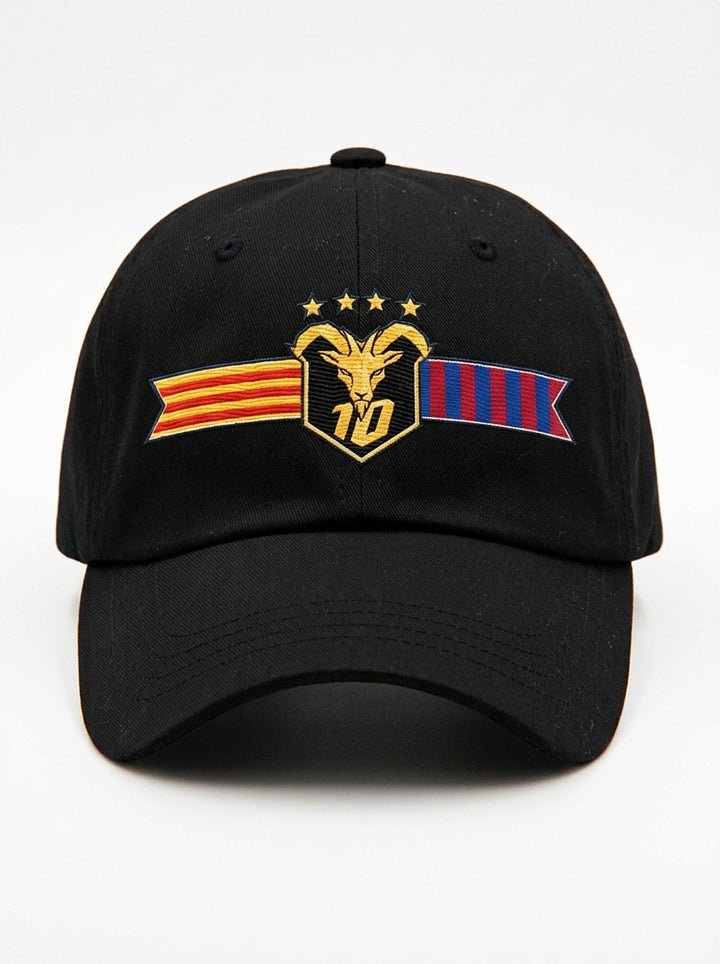 GOAT Catalan dad hat in Oji Black, front view — the full-colour Catalan crest embroidered on the crown: gold goat, No. 10, four stars, split Senyera and blaugrana banner.