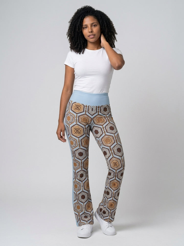 AnanseNova™ Flare Leggings in Igwe Blue™, studio front view — SunBorn