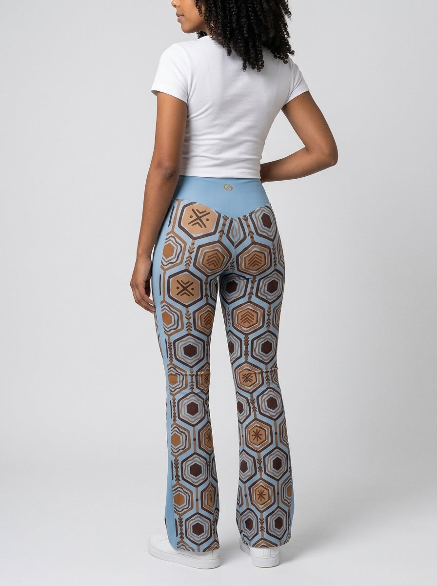 AnanseNova™ Flare Leggings in Igwe Blue™, back view — SunBorn