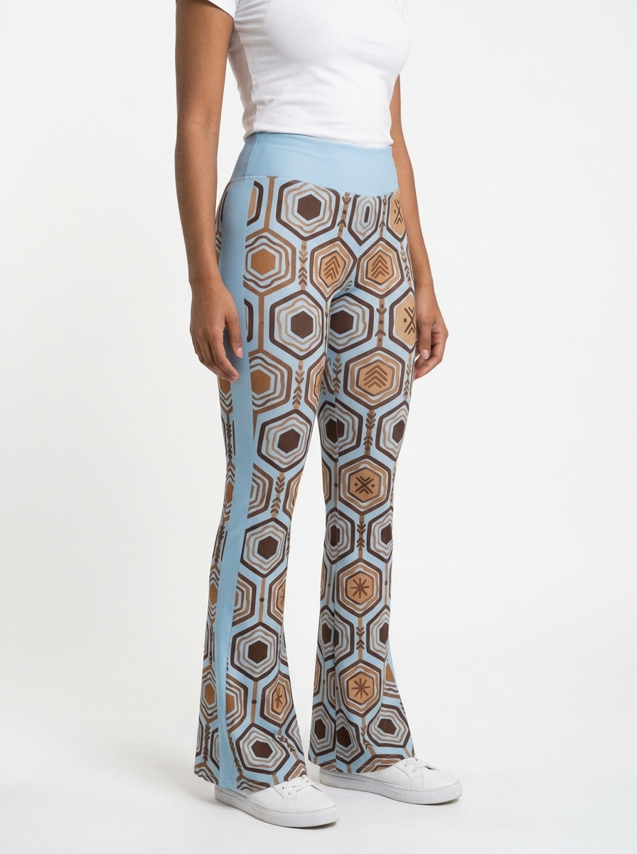 AnanseNova™ Flare Leggings in Igwe Blue™, three-quarter angle right — SunBorn