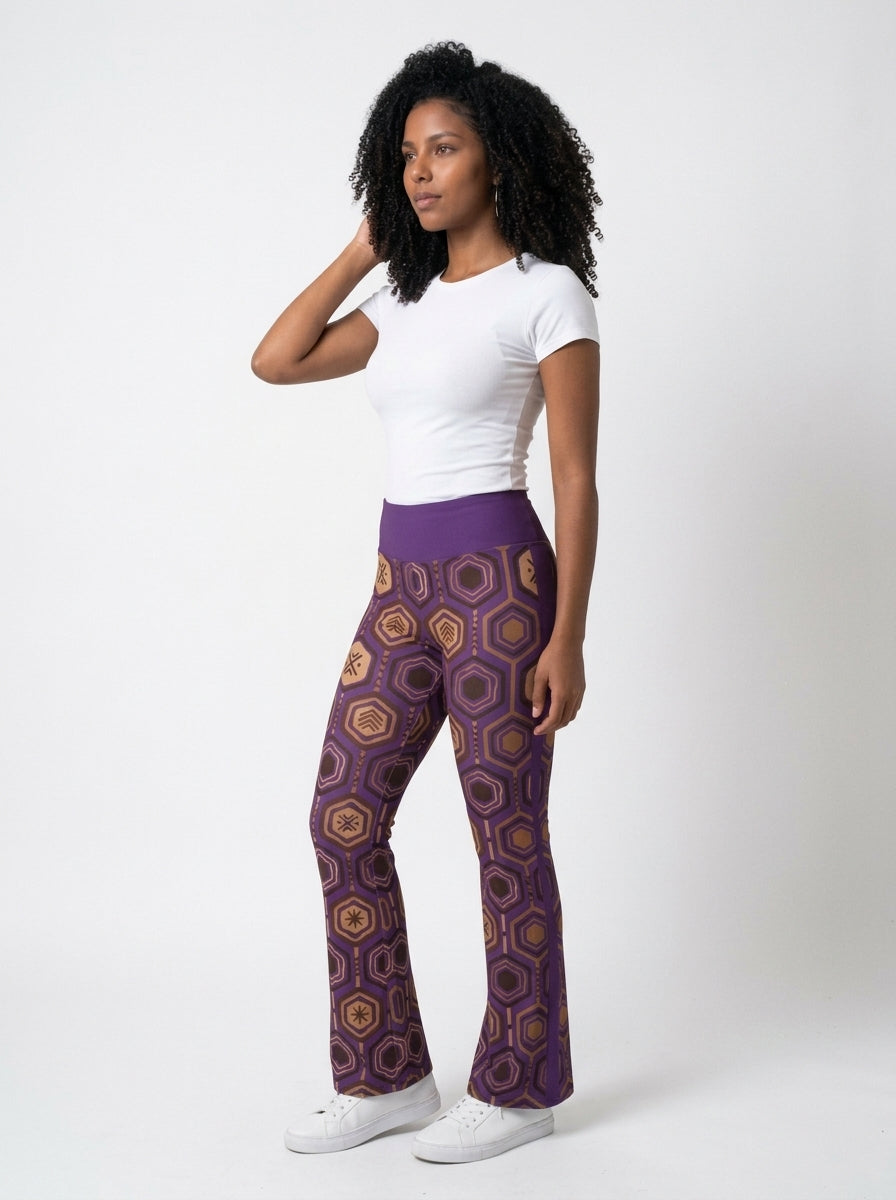 AnanseNova™ Flare Leggings in Ugo Purple, three-quarter angle left — SunBorn