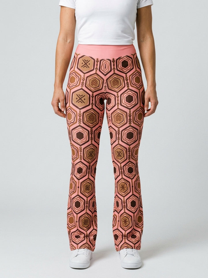 AnanseNova™ Flare Leggings in Adaeze Pink, studio front view — SunBorn