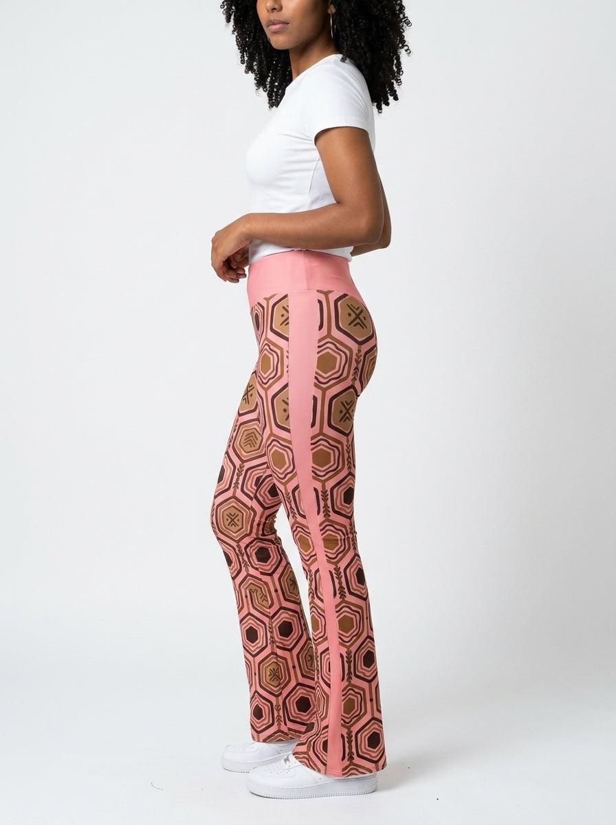 AnanseNova™ Flare Leggings in Adaeze Pink, three-quarter angle left — SunBorn