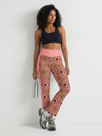 AnanseNova™ Flare Leggings in Adaeze Pink, lifestyle candid shot — SunBorn