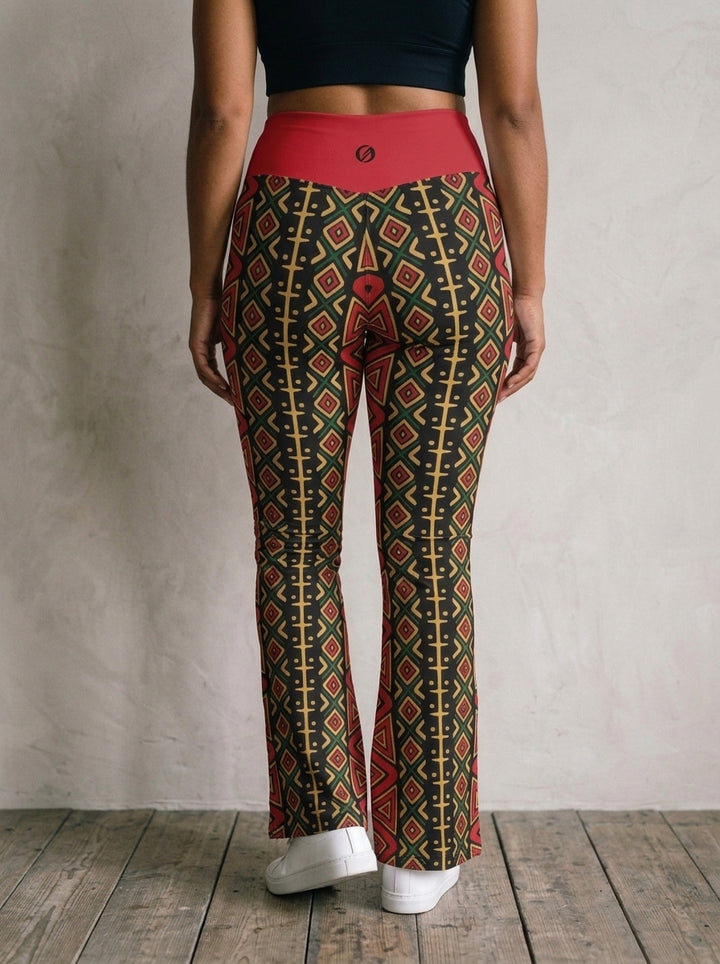 N'Donso™ Flare Leggings in Uhie Red, back view — Hunter's Road print down both legs under a solid red waistband with the gold SunBorn mark.