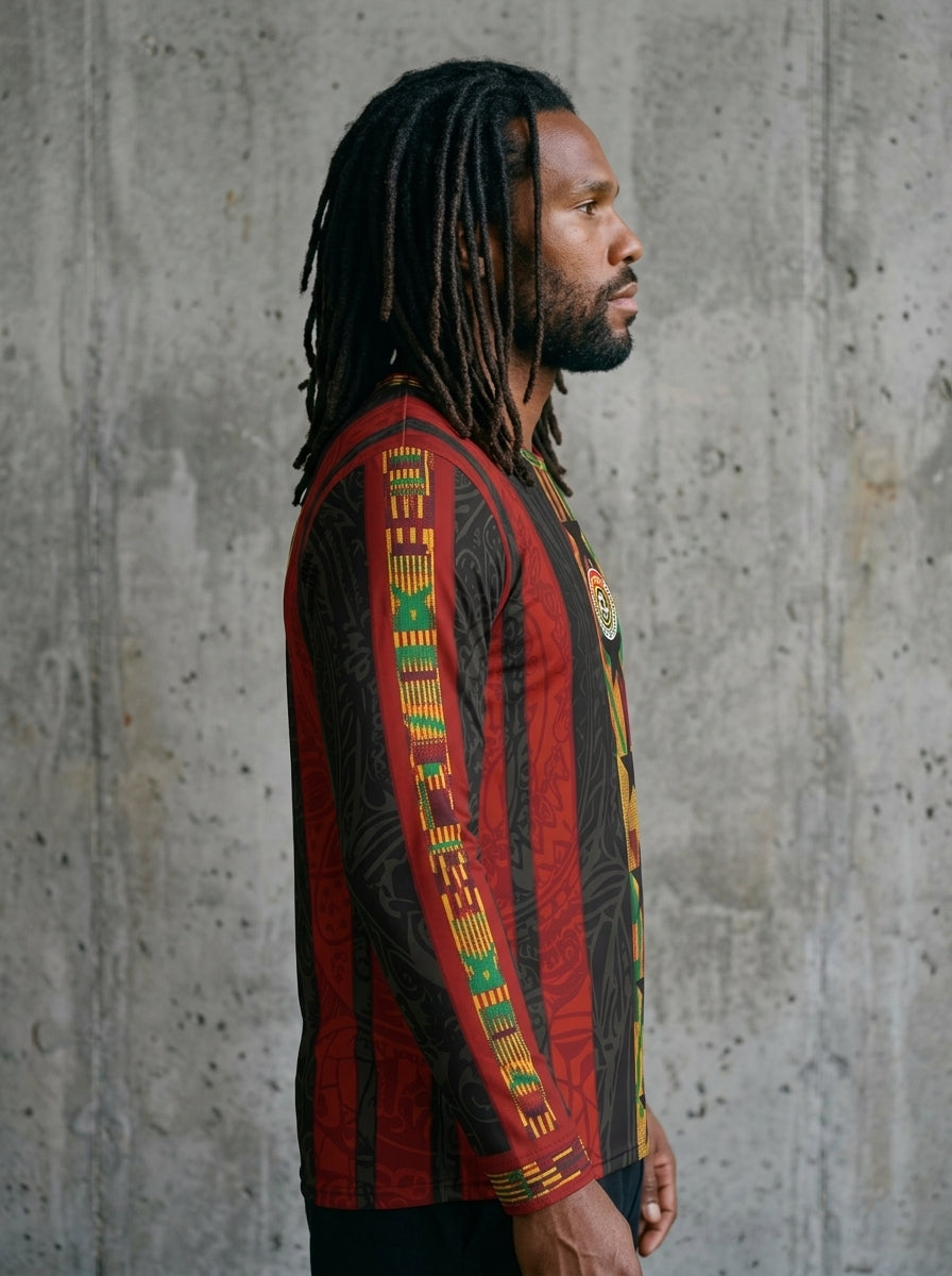 Lateral sleeve detail — Ghana '26 Kente Protocol Long Sleeve — kente geometry running down the arm
