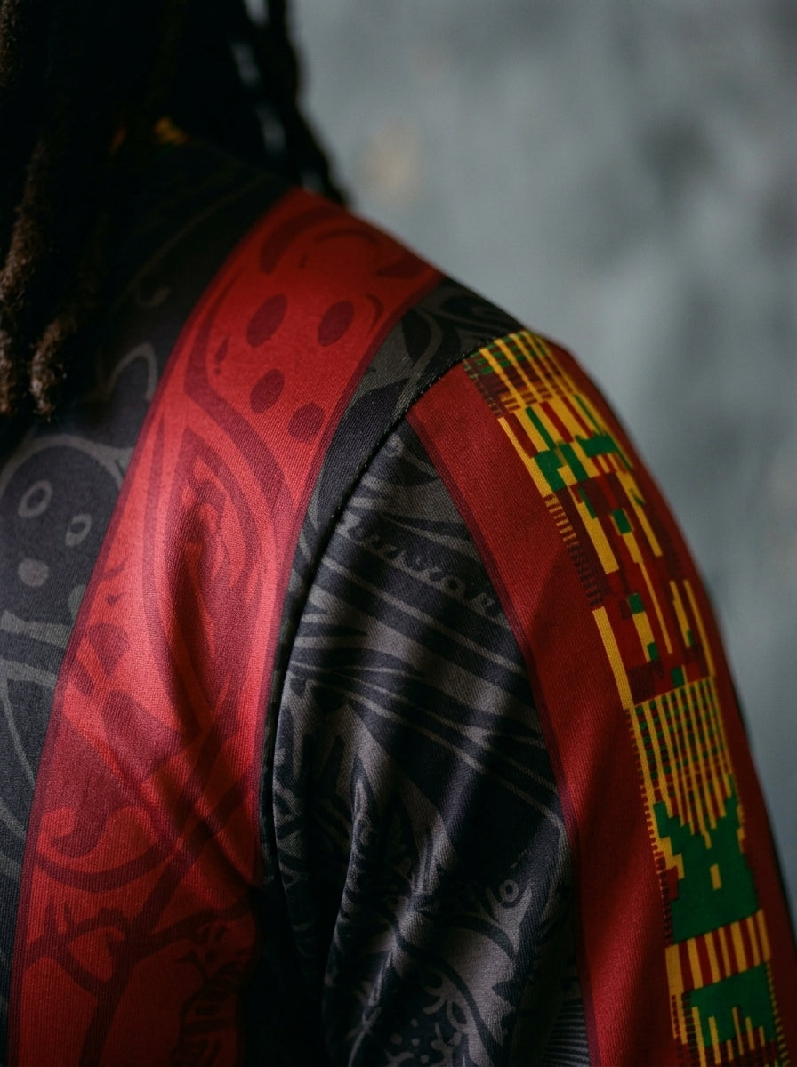 Macro cuff detail — Ghana '26 Long Sleeve — double-needle hem construction