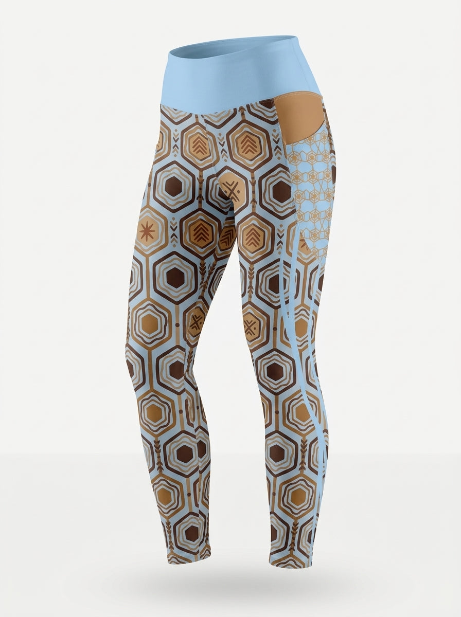 AnanseNova™ Pocket Leggings in Igwe Blue on a ghost mannequin, three-quarter left view
