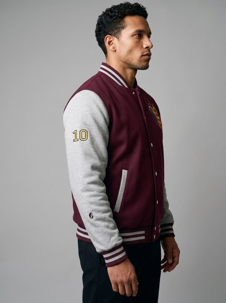 GOAT // Catalan Letterman Jacket in burgundy, three-quarter right view.