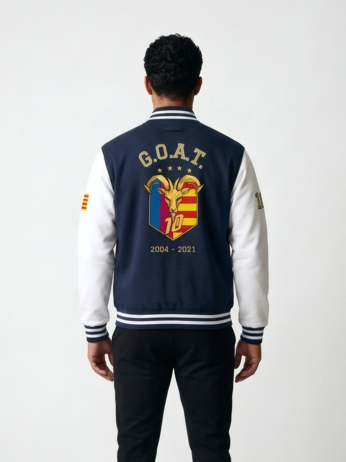 GOAT // Catalan Letterman Jacket in oxford navy, back view — arched G.O.A.T. over the full-colour Catalan crest.