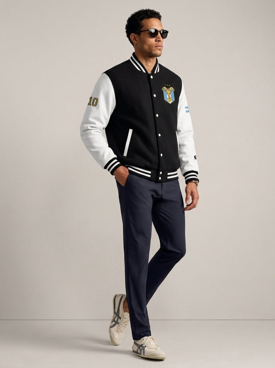 Lifestyle shot — GOAT // Celeste Letterman Jacket in Jet Black / Arctic White, styled.