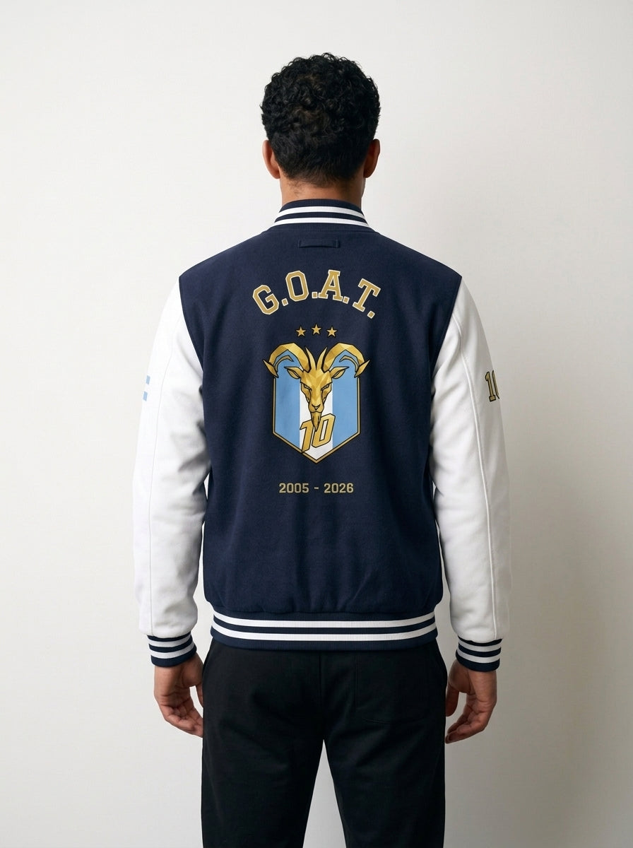 GOAT // Celeste Letterman Jacket in Oxford Navy / Arctic White, back — arched G.O.A.T. and the Celeste crest.