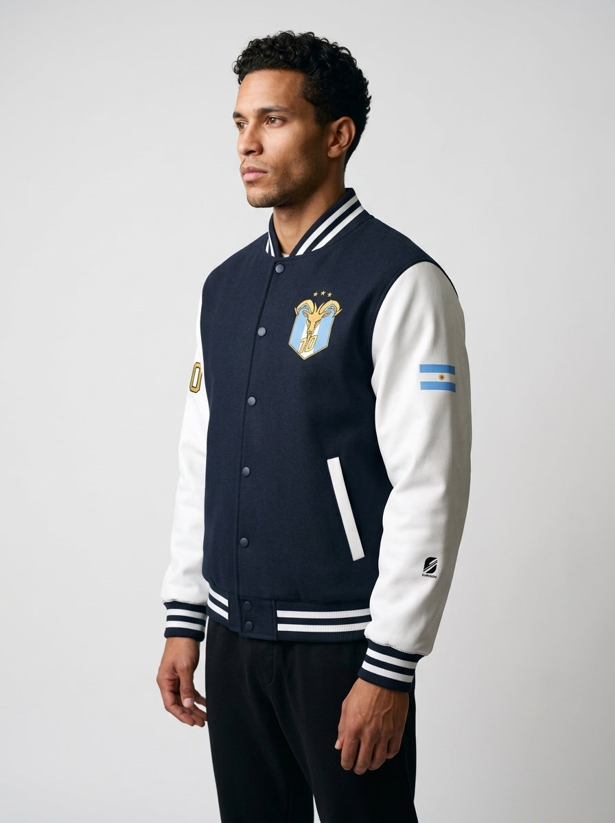 GOAT // Celeste Letterman Jacket in Oxford Navy / Arctic White, three-quarter left.