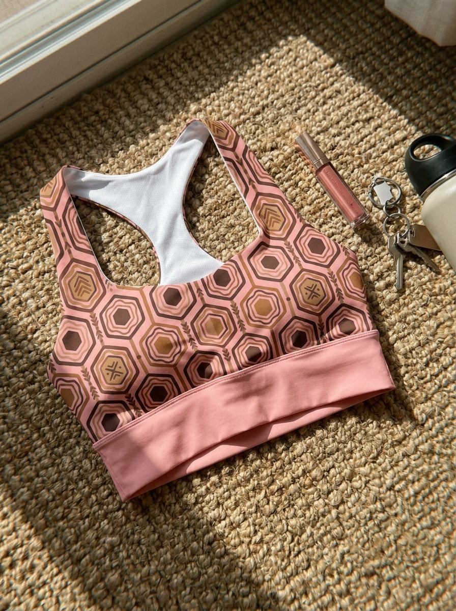 AnanseNova™ Longline Sports Bra in Adaeze Pink, styled flat lay — SunBorn