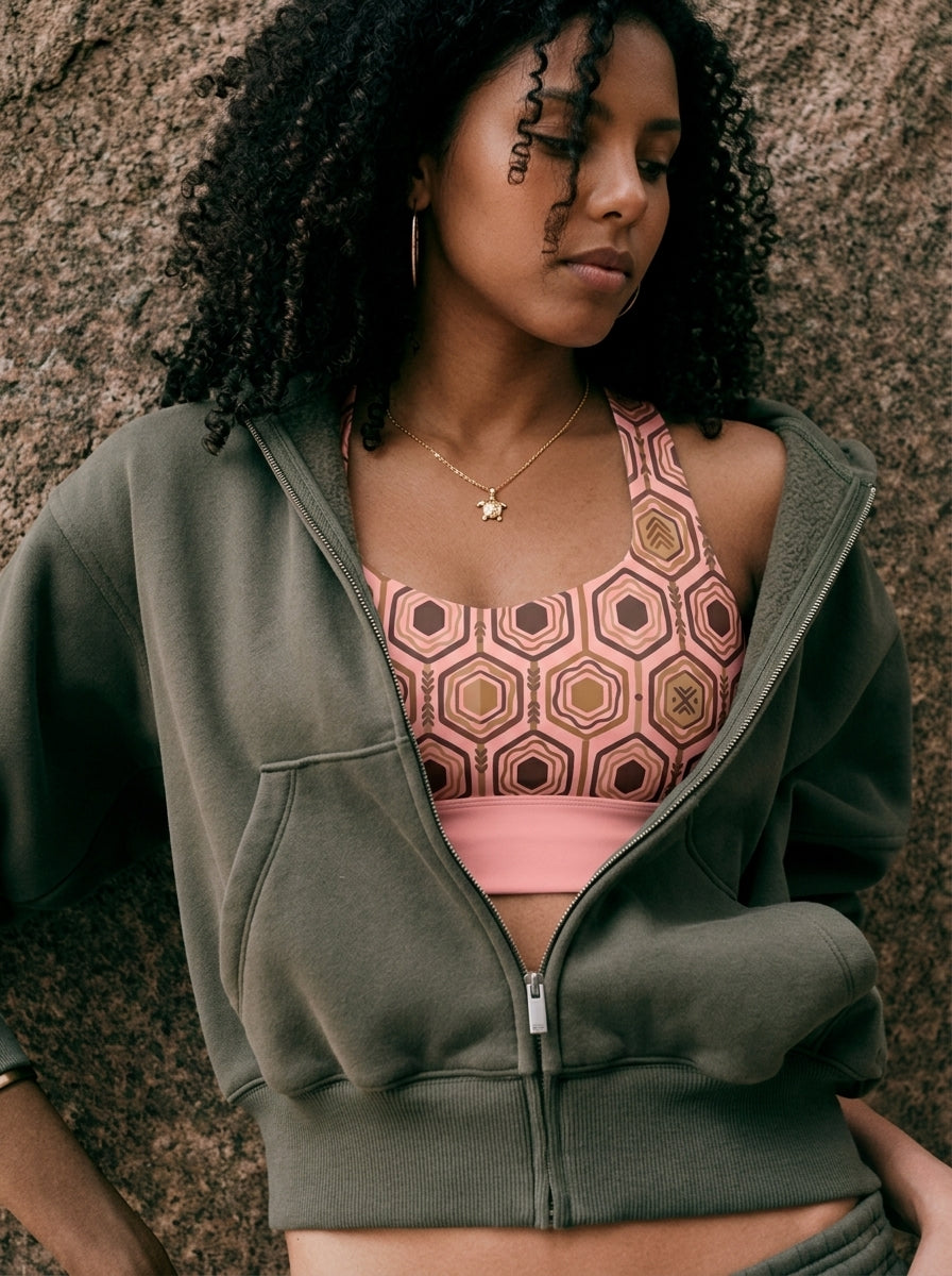 AnanseNova™ Longline Sports Bra in Adaeze Pink, lifestyle candid shot — SunBorn