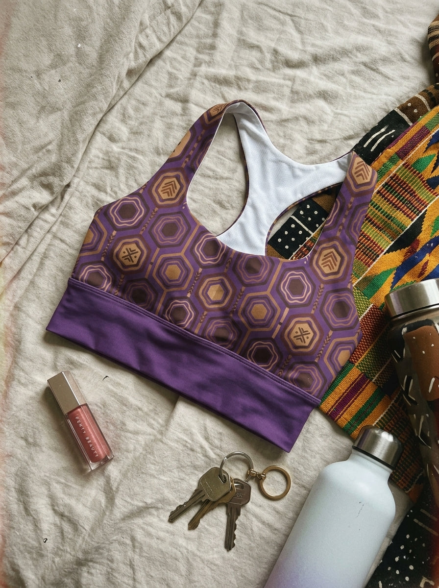 AnanseNova™ Longline Sports Bra in Ugo Purple, styled flat lay — SunBorn