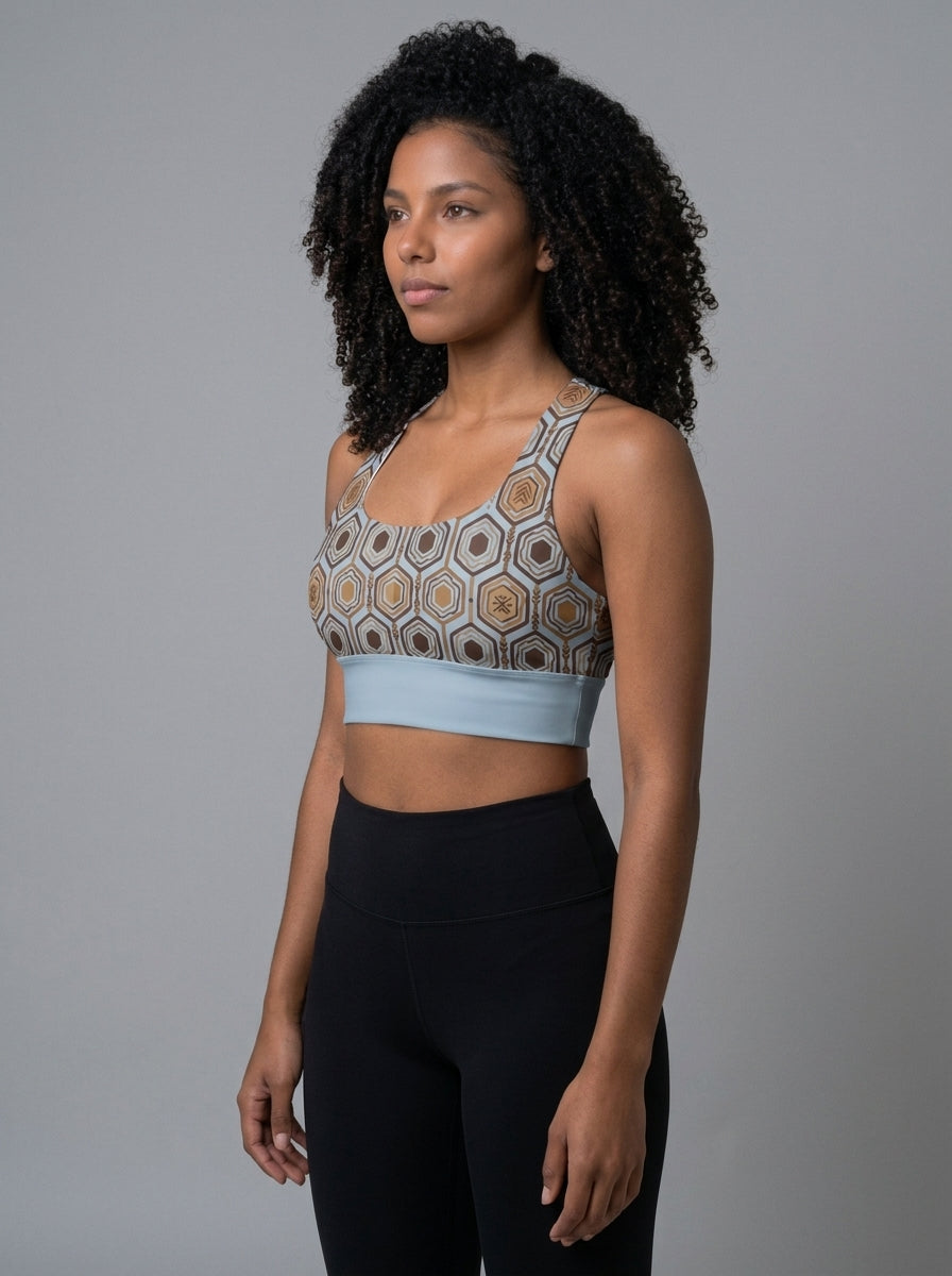 AnanseNova™ Longline Sports Bra in Igwe Blue™, three-quarter angle left — SunBorn