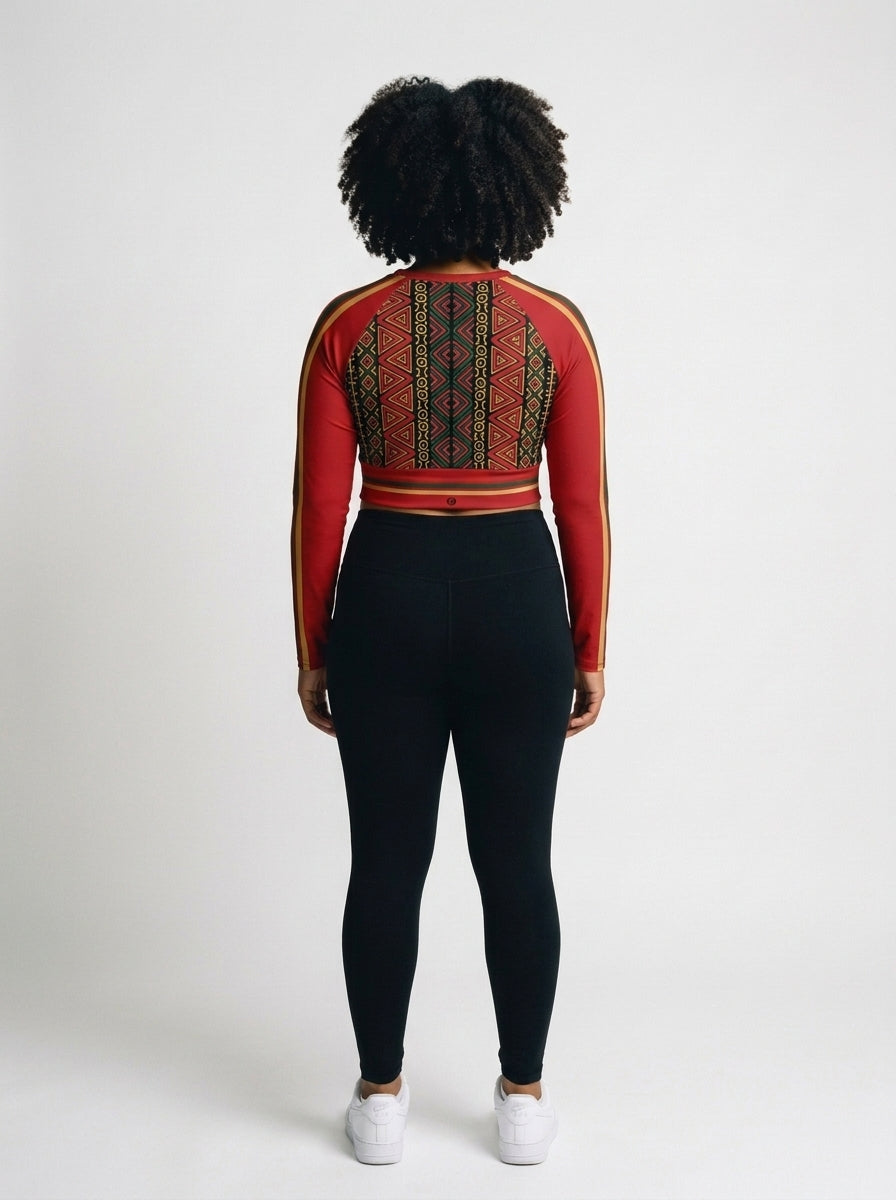 Back view of the N'Donso™ Long Sleeve Crop in Uhie Red, the red-on-black Hunter's Road print across the back and sleeves