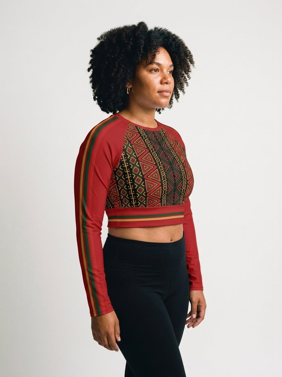 N'Donso™ Long Sleeve Crop in Uhie Red, three-quarter right, showing the side and sleeve print